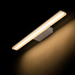 MAREA 60 LED fürdőszobai fali lámpa a Bazzikoshop kínálatában, Rendl Light, bekapcsolt állapotban sötét háttér előtt