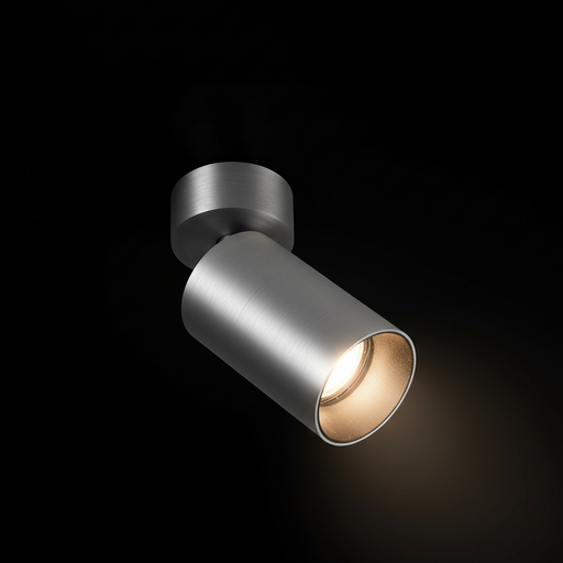 STAN Aluminum spotlámpa a Bazzikoshop kínálatában, Faro Barcelona, bekapcsolt állapotban sötét háttér előtt